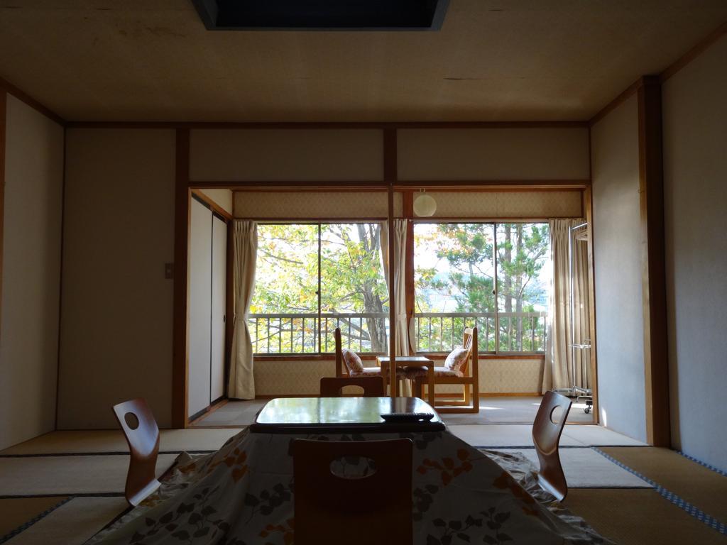 Oomukou Ryokan Hakuba Zimmer foto